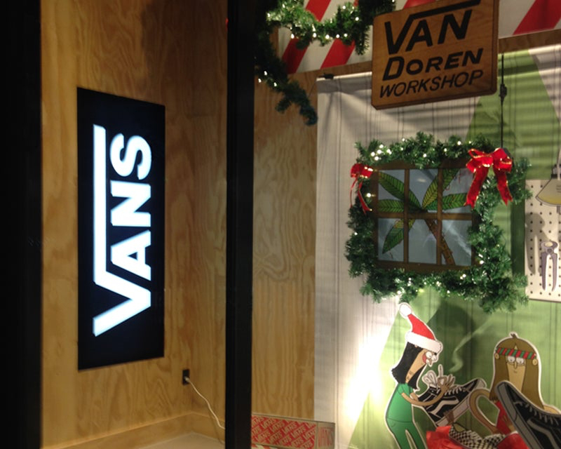 A DSA Signage Backlit LED Frameless Fabric Light Boxes in a Vans retail store