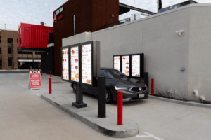 CLydes Hot Chicken Double lane drive thru with DSA Signage